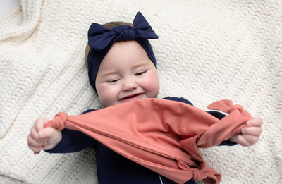 4 Practical Reasons a Onesie Belongs in Your Baby’s Sleep Wardrobe